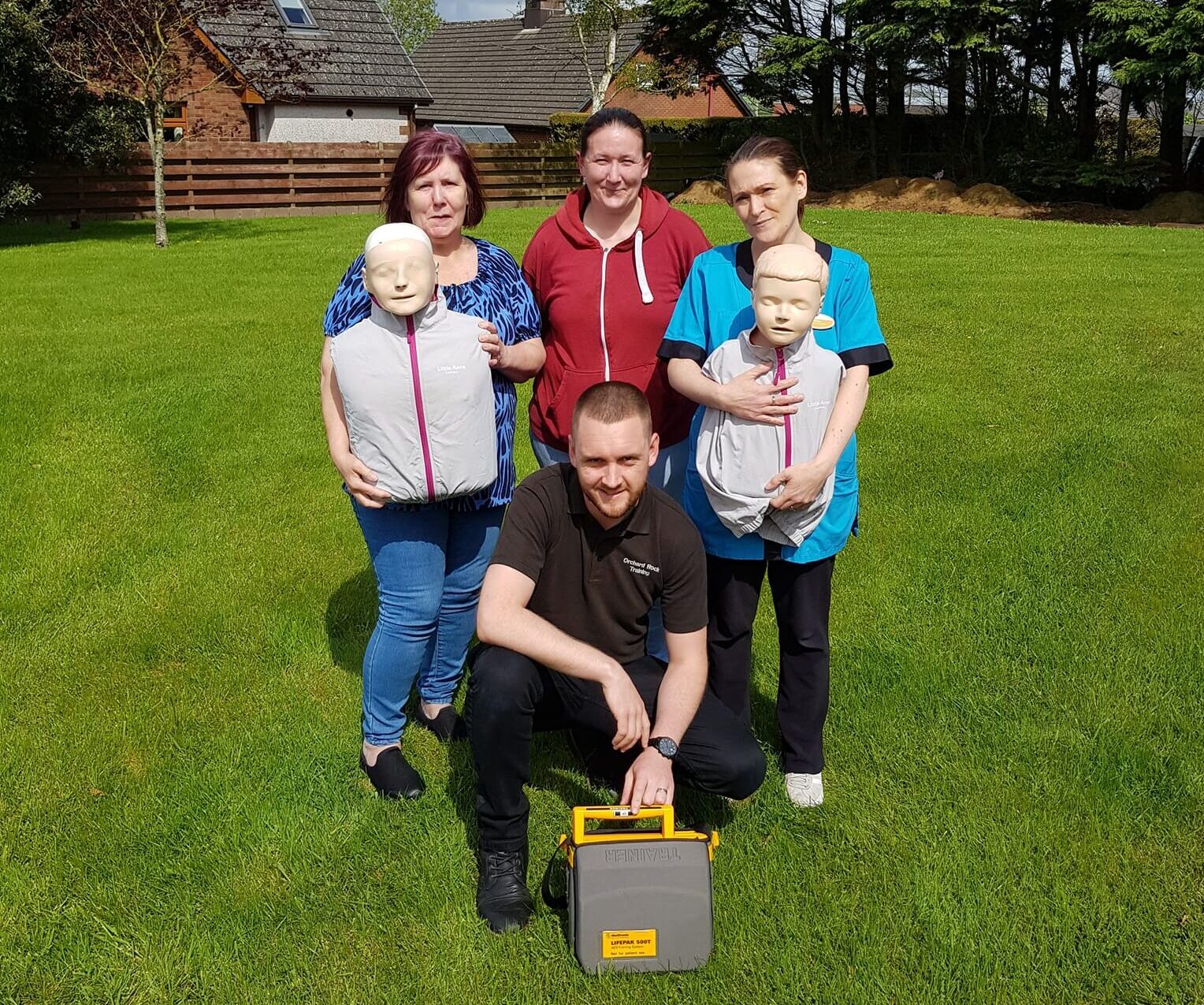 Group first aid and defibrillator training session