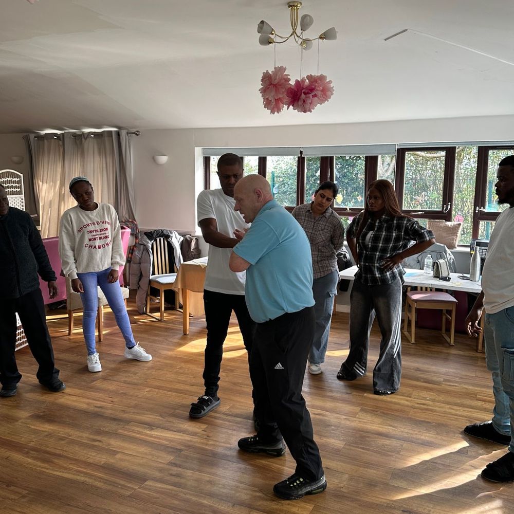 Behaviour management training session in a care setting