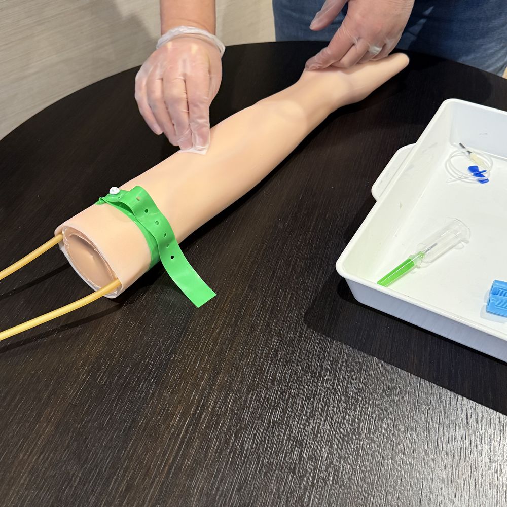 Venepuncture training equipment and practice arm