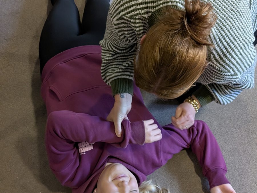 Placing a casualty into the recovery position